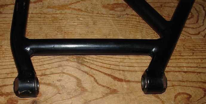 champhered control arm.JPG