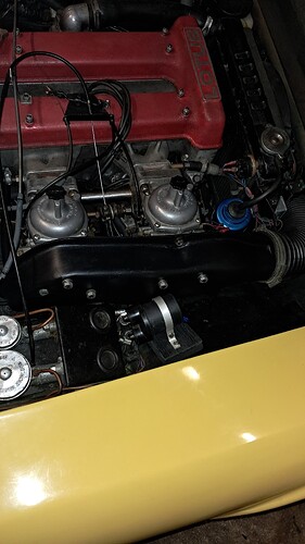 Engine bay with pump